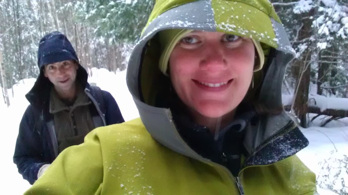It might be snowing and cold, but we are dry and warm in our soft shell jackets and wool pants.