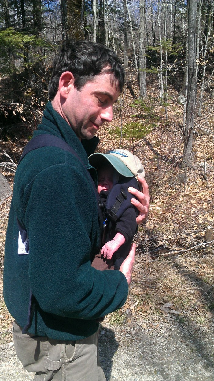 Andrew gives Alden his hat to shield his eyes as we walked along the road to the trail head.