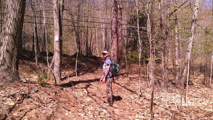 Andrew hiking up the yellow trail.