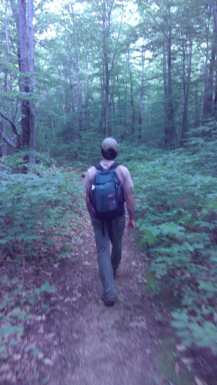 Andrew hikes along the Basin Trail.