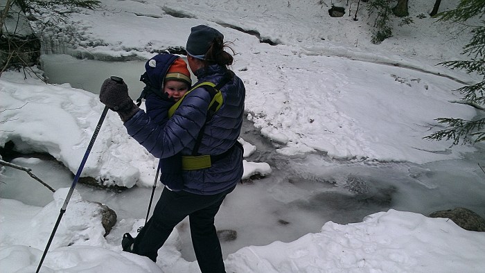 Lindsay and Alden step down toward a stream crossing.