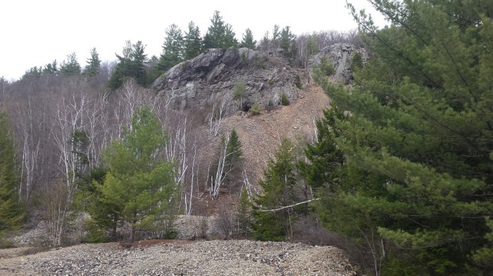 Towering above the pond is the Mascot Mine entrance.