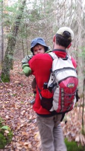 Andrew carrying Alden.