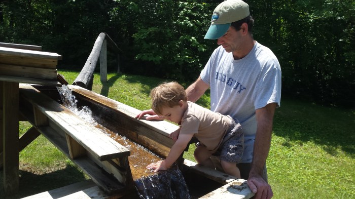 He was ready to go home, but then Alden found the water for the rock sifting activity (you can buy a bag of sand/rocks to sift).  