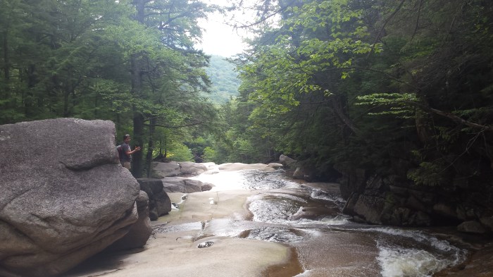 Can you find Sarah on the boulder?